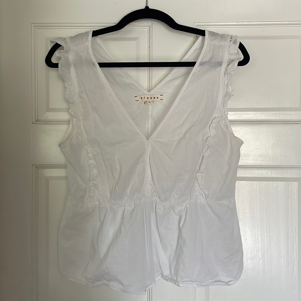 Xirena Penelope tank with ruffles.